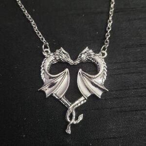 Dragons intertwined into heart shape necklace